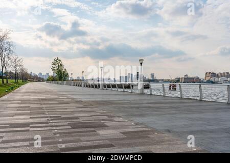 A city park along the Huangpu river, in Shanghai, China. Stock Photo