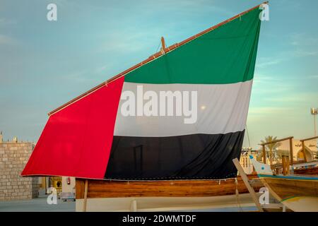 National United Arab Emirates flag on a yacht, red, green, white and black colors of UAE flag Stock Photo