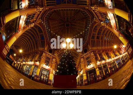 London, UK. - 20 Dec 2020: Fisheye image of the central dome of Leadenhall Market in the City of London, designed by Horace Jones and dating from the late C.19, decorated for the Christmas 2020 festive season. Stock Photo