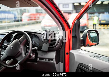 Royal Mail red post van inside Stock Photo