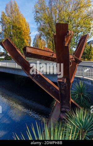 2002 Graham Bennett designed Christchurch Firefighters Memorial, built from 5 steel girders from the 9/11 destroyed World Trade Center in New York. Stock Photo