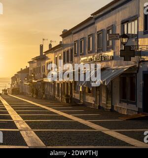 Porto Covo, Portugal - 20 December 2020: main street in Porto Covo at sunset Stock Photo