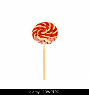 Swirling red and white Lollipop isolated on a white background Stock Photo