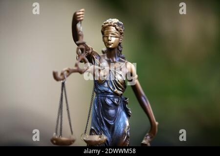 Law and Justice concept with scale and Themis in background. Composition in court Stock Photo