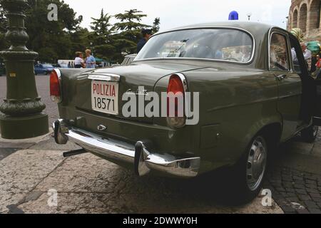 Verona, Italy - May 20, 2006: Police cars, vintage classic cars, of the brands Fiat and Alfa Romeo at a show, in the city of Verona. Stock Photo