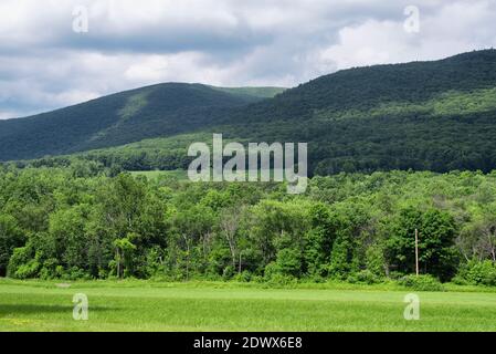 The Taconic mountain range landscape as seen from Rt 22 in Boston Corner New York State on an overcast day. Stock Photo