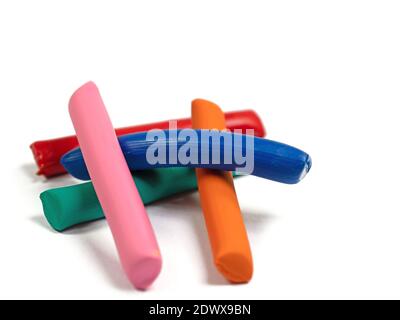 Colorful plasticine against a white background Stock Photo