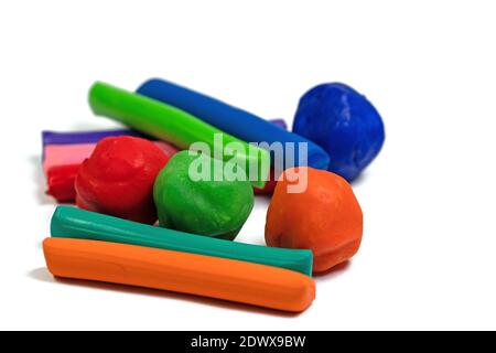 Colorful plasticine against a white background Stock Photo