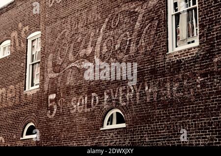 A vintage ad for Coca-Cola - a faded mural on a building wall in the Historic Downtown Mall, Charlottesville, Virginia, USA Stock Photo