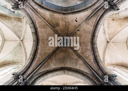 Combourg, France - July 27, 2018: Notre-Dame church of Combourg. Directy below view of the vaults Stock Photo