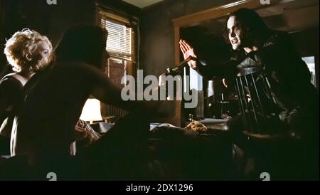 USA. Brandon Lee , Michael Massee and Anna Thomson in a scene from the