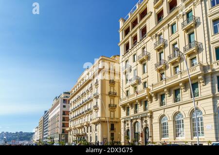 Naples, Italy October 2020: Grand Hotel Excelsior and ancient baroque style palaces on Partenope Street, The beautiful and famous seafront of Naples Stock Photo
