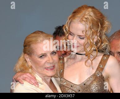 The Hollywood actress Lauren Bacall has died at the age of 89 after suffering a stroke at her New York home. File photo : US legendary actress Lauren Bacall (L) and Australian movie star Nicole Kidman on stage at the Deauville Casino after the screening of their latest movie 'Birth' directed by Jonathan Glazer, at the 30th American Film Festival in Deauville, Normandy, France, Thursday, Sept. 9, 2004. Photo by Bruno Klein/ABACA Stock Photo