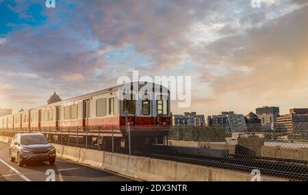 Boston subway lines, train crossing Longfellow bridge over scenic Charles river. Stock Photo