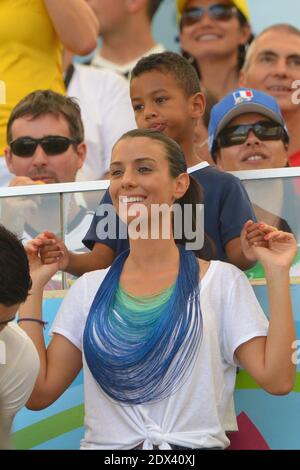 France's player wives Ludivine Sagna, Mrs Cabaye and Mrs Mavuba in Soccer World Cup 2014 1/4 of Final round match France vs Germany at Maracana Stadium, Rio de Janeiro, Brazil on July 4, 2014. Germany won 1-0 . Photo by Henri Szwarc/ABACAPRESS.COM Stock Photo