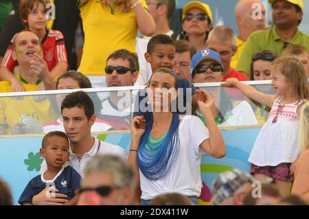 France's player wives Ludivine Sagna, Mrs Cabaye and Mrs Mavuba in Soccer World Cup 2014 1/4 of Final round match France vs Germany at Maracana Stadium, Rio de Janeiro, Brazil on July 4, 2014. Germany won 1-0 . Photo by Henri Szwarc/ABACAPRESS.COM Stock Photo