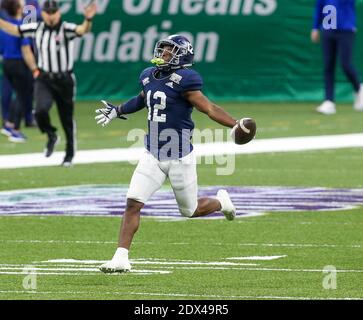 New Orleans, LA, USA. 23rd Dec, 2020. Georgia Southern's Anthony Wilson (12) celebrates after catching an interception during the R L Carriers New Orleans Bowl between the Louisiana Tech Bulldogs and the Georgia Southern Eagles at the Mercedes Benz Superdome in New Orleans, LA. Jonathan Mailhes/CSM/Alamy Live News Stock Photo