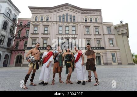 A view of the street of New York at 'Cinecitta World', the new italian movie theme park unveiled in Rome, Italy on July 10, 2014. A richly detailed Italian theme park conjures up the cinematic worlds of 'Ben Hur,' 'Dante's Inferno' and 'Gangs of New York.' The look is a mix of sword and sandals epics, Fellinesque and Bollywood elements, including gigantic elephants, science fiction, spaghetti westerns and many other themes concocted by Dante Ferretti from the more than 3,000 movies and TV shows produced at Cinecitta, once known as Hollywood on the Tiber. Located about 15 km south of Rome on an Stock Photo