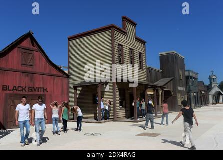 A view of the western set at 'Cinecitta World', the new italian movie theme park unveiled in Rome, Italy on July 10, 2014. A richly detailed Italian theme park conjures up the cinematic worlds of 'Ben Hur,' 'Dante's Inferno' and 'Gangs of New York.' The look is a mix of sword and sandals epics, Fellinesque and Bollywood elements, including gigantic elephants, science fiction, spaghetti westerns and many other themes concocted by Dante Ferretti from the more than 3,000 movies and TV shows produced at Cinecitta, once known as Hollywood on the Tiber. Located about 15 km south of Rome on an expans Stock Photo