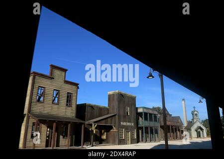 A view of the western set at 'Cinecitta World', the new italian movie theme park unveiled in Rome, Italy on July 10, 2014. A richly detailed Italian theme park conjures up the cinematic worlds of 'Ben Hur,' 'Dante's Inferno' and 'Gangs of New York.' The look is a mix of sword and sandals epics, Fellinesque and Bollywood elements, including gigantic elephants, science fiction, spaghetti westerns and many other themes concocted by Dante Ferretti from the more than 3,000 movies and TV shows produced at Cinecitta, once known as Hollywood on the Tiber. Located about 15 km south of Rome on an expans Stock Photo