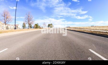 Driving on typical paved roads in suburban America. Stock Photo