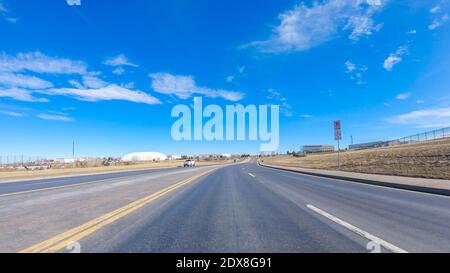 Driving on typical paved roads in suburban America. Stock Photo