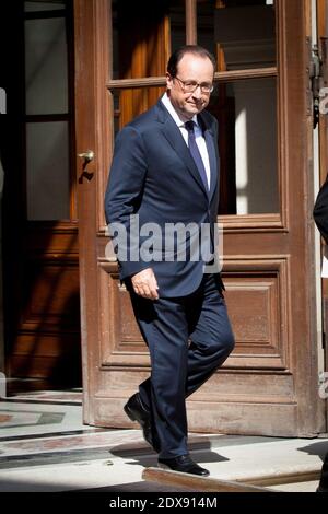 French President Francois Hollande leaving a meeting with representatives of NGOs Climate, Sustainable Development and International Solidarity, held at Hotel de Marigny, in Paris, France on September 20, 2014. Photo by Audrey Poree/ABACAPRESS.COM Stock Photo