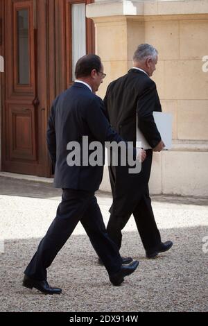 French President Francois Hollande leaving a meeting with representatives of NGOs Climate, Sustainable Development and International Solidarity, held at Hotel de Marigny, in Paris, France on September 20, 2014. Photo by Audrey Poree/ABACAPRESS.COM Stock Photo