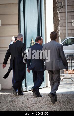 French President Francois Hollande leaving a meeting with representatives of NGOs Climate, Sustainable Development and International Solidarity, held at Hotel de Marigny, in Paris, France on September 20, 2014. Photo by Audrey Poree/ABACAPRESS.COM Stock Photo