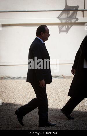 French President Francois Hollande leaving a meeting with representatives of NGOs Climate, Sustainable Development and International Solidarity, held at Hotel de Marigny, in Paris, France on September 20, 2014. Photo by Audrey Poree/ABACAPRESS.COM Stock Photo