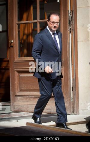 French President Francois Hollande leaving a meeting with representatives of NGOs Climate, Sustainable Development and International Solidarity, held at Hotel de Marigny, in Paris, France on September 20, 2014. Photo by Audrey Poree/ABACAPRESS.COM Stock Photo