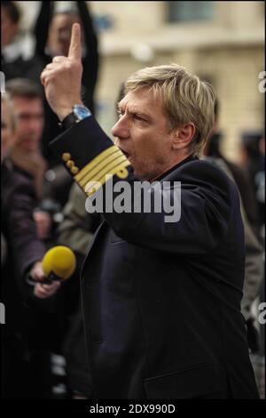 French pilots of Air France company demonstrate near French Parliament in Paris, France, on September 23, 2014. French Prime Minister Manuel Valls speaks out against Air France pilots who are striking for an eighth day over the proposed expansion of its low-cost carrier, Transavia. The strike forced the airline to cancel about 60% of its flights, is undermining its precarious finances, causing a daily operating loss of 20 million euros. Photo by Renaud Khanh/ABACAPRESS.COM Stock Photo