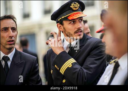 French pilots of Air France company demonstrate near French Parliament in Paris, France, on September 23, 2014. French Prime Minister Manuel Valls speaks out against Air France pilots who are striking for an eighth day over the proposed expansion of its low-cost carrier, Transavia. The strike forced the airline to cancel about 60% of its flights, is undermining its precarious finances, causing a daily operating loss of 20 million euros. Photo by Renaud Khanh/ABACAPRESS.COM Stock Photo