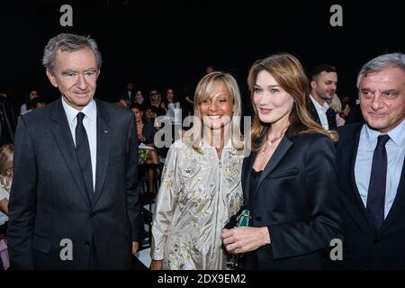 Carla Bruni, Bernard Arnault, his wife Helene, Sydney Tolendo arriving at  the Dior Spring-Summer 2015