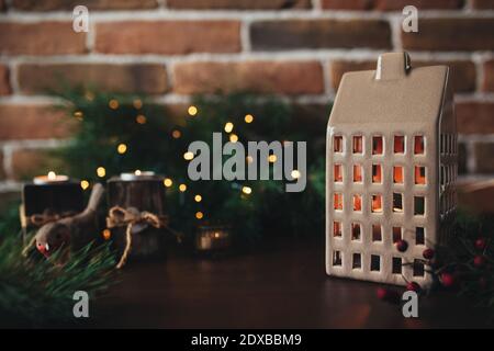 Christmas vintage candles and candlestick, christmas lights, christmas tree Stock Photo