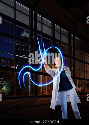 Female gastroenterologist light painting esophagus in laboratory at hospital Stock Photo