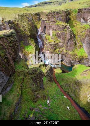 Scenic view of Fjadra river flowing through Fjadrargljufur canyon Stock Photo