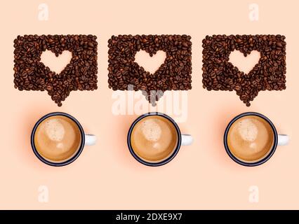 Studio shot of mugs of coffee and roasted coffee beans arranged into shapes of online chat bubbles Stock Photo