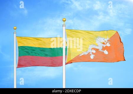 Lithuania and Bhutan two flags on flagpoles and blue sky Stock Photo