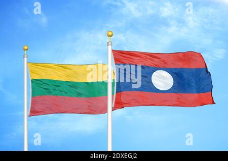 Lithuania and Laos two flags on flagpoles and blue sky Stock Photo