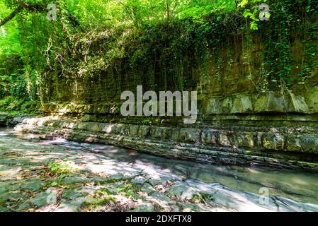 Textures of various stone layers in mountain river Stock Photo