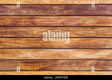 A Wooden boards in brown, ochre and yellow in a horizontal position for a wedding, Christmas or any other event. Stock Photo