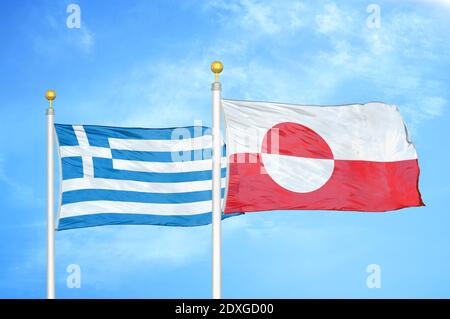 Greece and Greenland two flags on flagpoles and blue sky