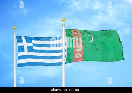 Greece and Turkmenistan two flags on flagpoles and blue sky Stock Photo