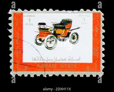 MOSCOW, RUSSIA - MARCH 30, 2019: A stamp printed in Ajman shows Old and racing cars, serie, circa 1973 Stock Photo