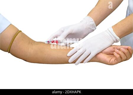 Blood test from venous vein  of patient by female doctor in white medical gloves on   the marble table Stock Photo