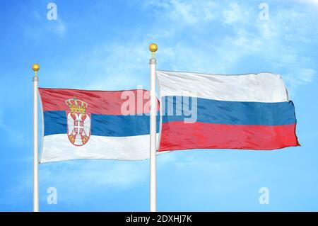 Sebian Vs. Russian Flags Russian and Serbian Flags Together Symbol at Blue Sky Stock Photo - Alamy