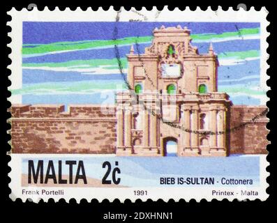 MOSCOW, RUSSIA - MARCH 23, 2019: Postage stamp printed in Malta shows Cottoner's Gate, National Heritage of the Maltese Islands serie, circa 1991 Stock Photo