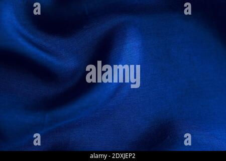 soft silk folds blue color - close up, decor and luxury textured fabric background Stock Photo