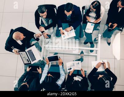 business team using a laptop to analyze financial data Stock Photo